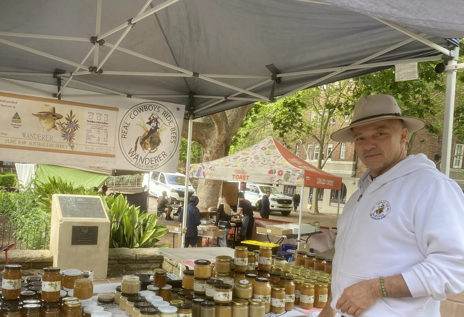 Dolfi At The Market Dc8ddd 1600 Dolfi at the Wanderer Honey market stall with jars of honey